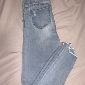 Light washed blue ripped jeans